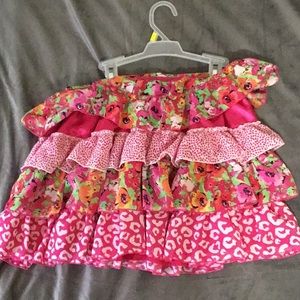 A beautiful skirt with designs on it. NEVER WORN